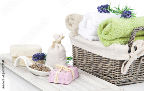 toiletries for relaxation - towel, soap, isolated on white backg photo