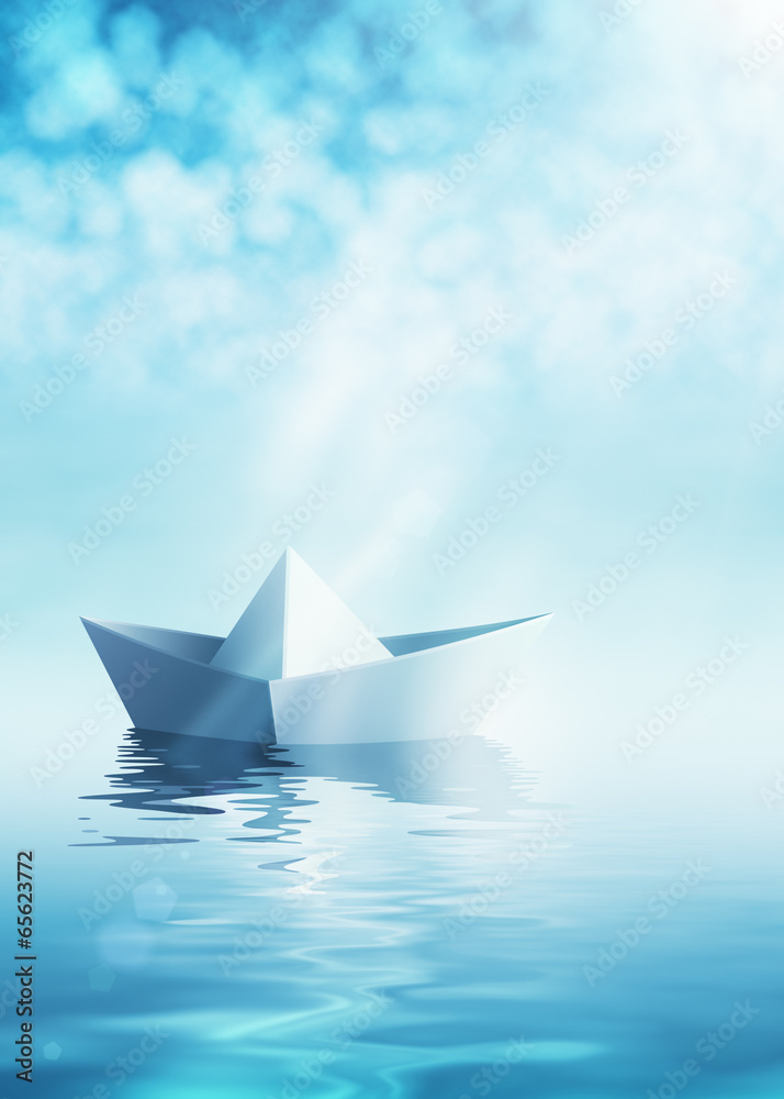 Paper boat on azure water