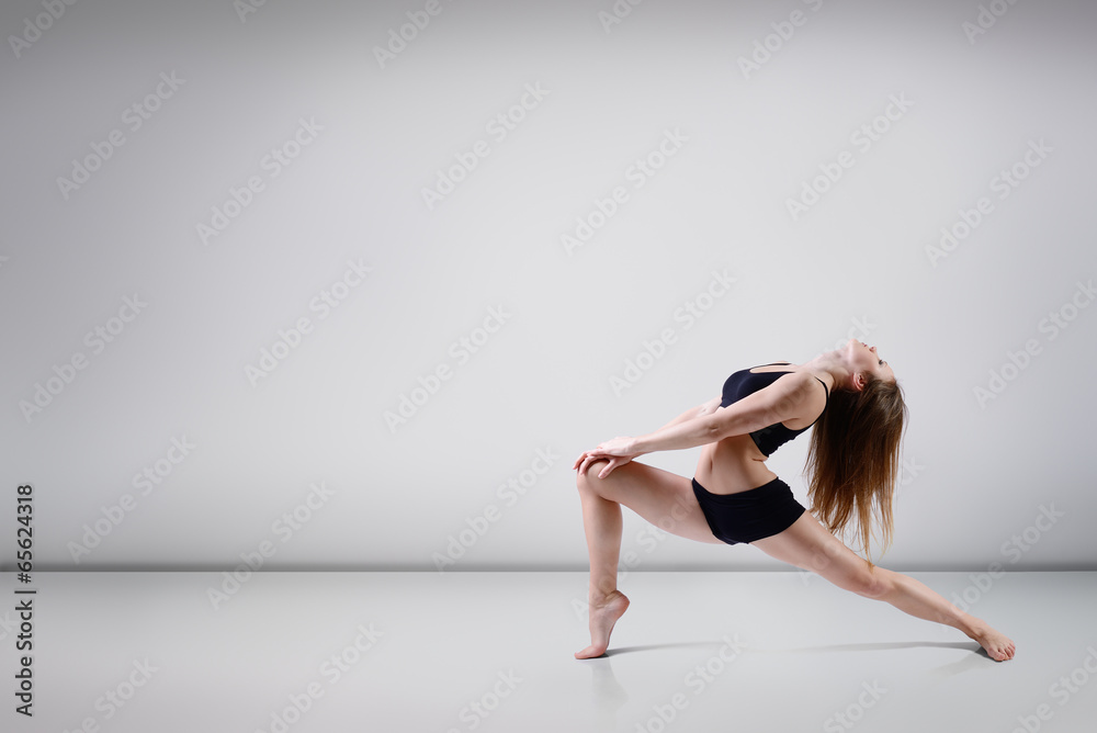 young beautiful dancer teen girl dancing and jumping, studio ser young beautiful dancer teen girl dancing and jumping, studio ser