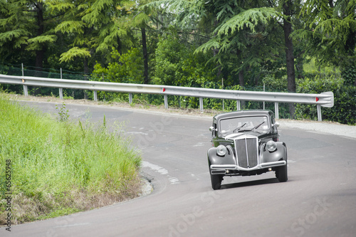 Vintage car in the hills photo