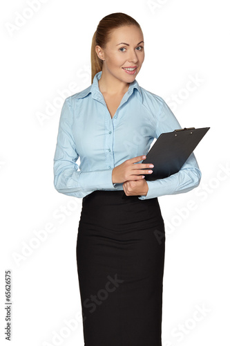 Full length of smiling woman making notes