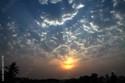 Dramatic Dawn Sun Skyscape Edge Lighted Cumulus Clouds