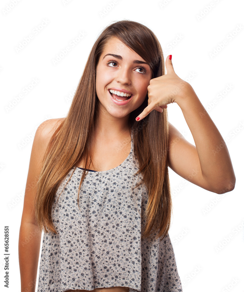 young woman doing a call gesture isolated on white young woman doing a call gesture isolated on white
