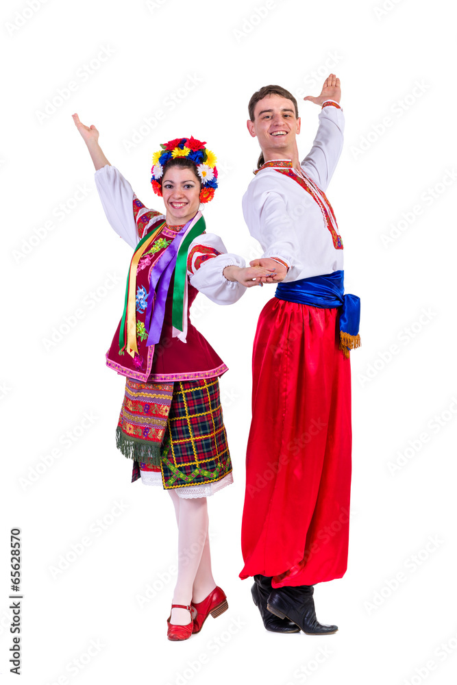beautiful dancing couple in ukrainian polish national