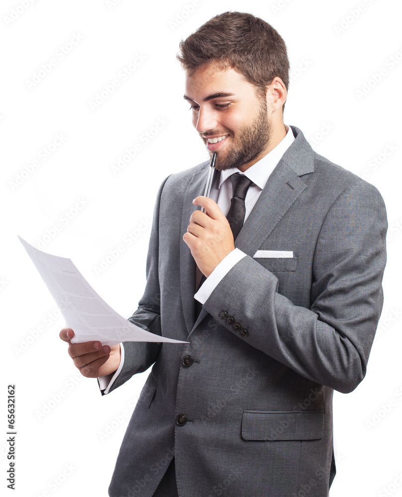 portrait of young business man pleased about a contract on white portrait of young business man pleased about a contract on white