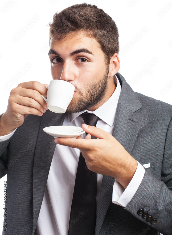 portrait of business man drinking a coffee cup on white backgrou portrait of business man drinking a coffee cup on white backgrou