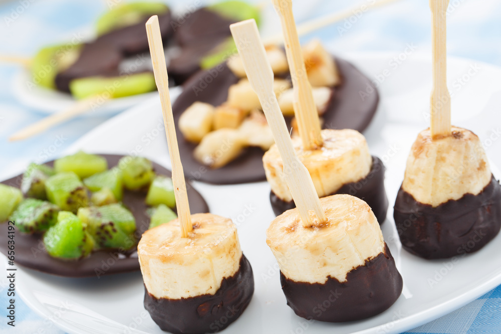 Banana with chocolate on a stick Banana with chocolate on a stick