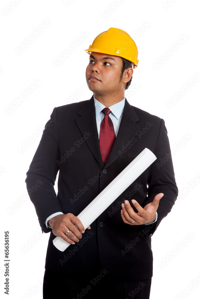 Asian engineer man about to hit a blueprint to his hand Asian engineer man about to hit a blueprint to his hand