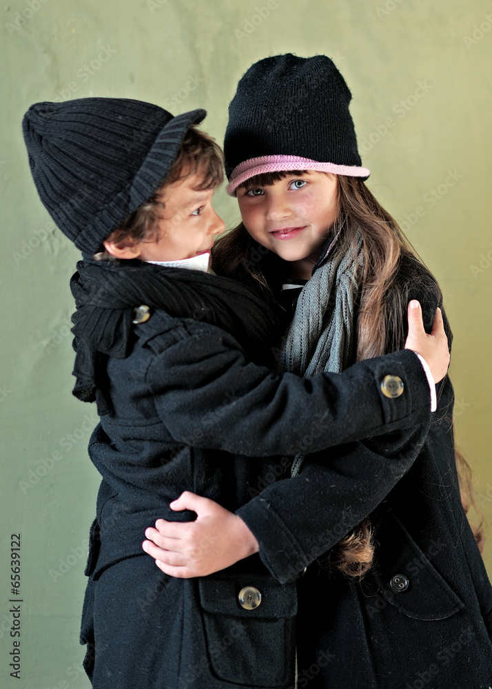 Portrait of a girl and boy in autumn Portrait of a girl and boy in autumn