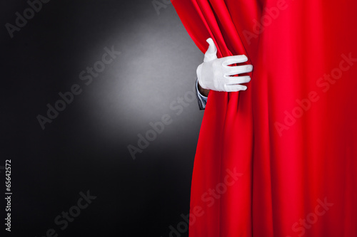Magician Opening Red Stage Curtain