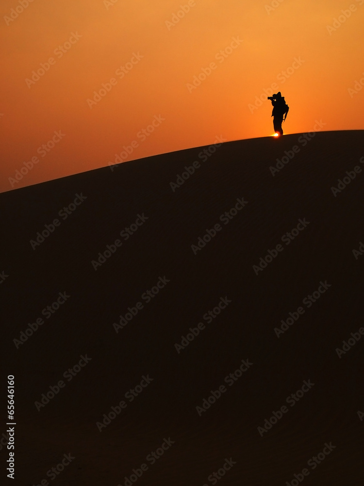 A man taking  photo at Thar Desert, Jaisalmer State, India