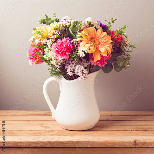 Wallpaper Mural Flower bouquet in white jug on wooden table Torontodigital.ca