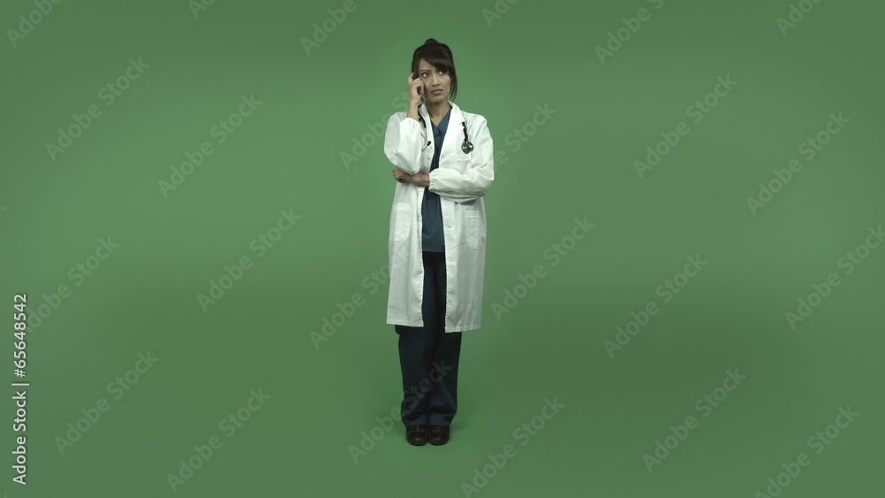 indian female doctor isolated on greenscreen thinking scartching
