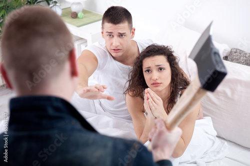 Canvas Print angry husband with hatchet caught cheating wife with lover