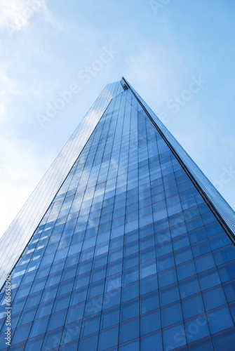 The Shard of Glass London towers into blue sky