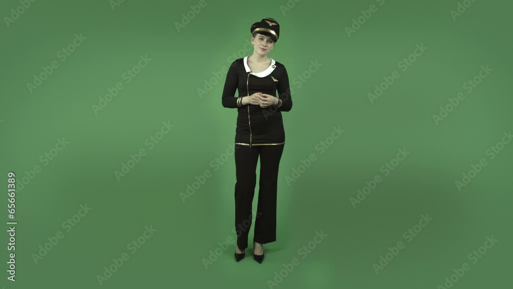 attractive caucasian air hostess isolated on green talking attractive caucasian air hostess isolated on green talking