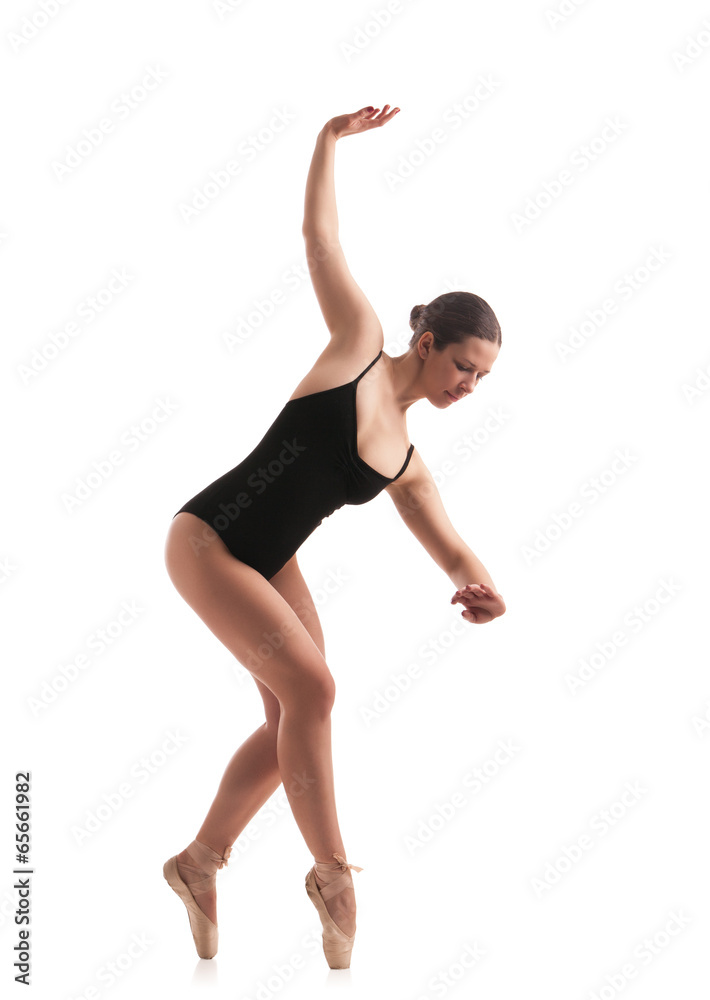 young beautiful dancer posing on studio background young beautiful dancer posing on studio background