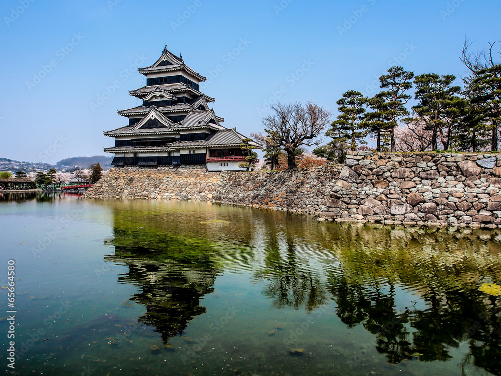 Matsumoto castle with blue sky in spring season Matsumoto castle with blue sky in spring season
