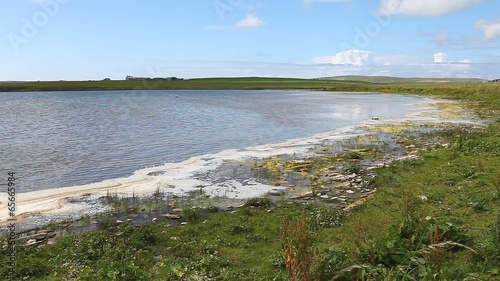 By the side of a loch in Orkney, Scotland photo