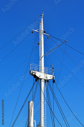Mast ship against of blue sky