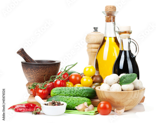 Fototapeta Naklejka Na Ścianę i Meble -  Fresh ingredients for cooking: tomato, cucumber, mushroom and sp