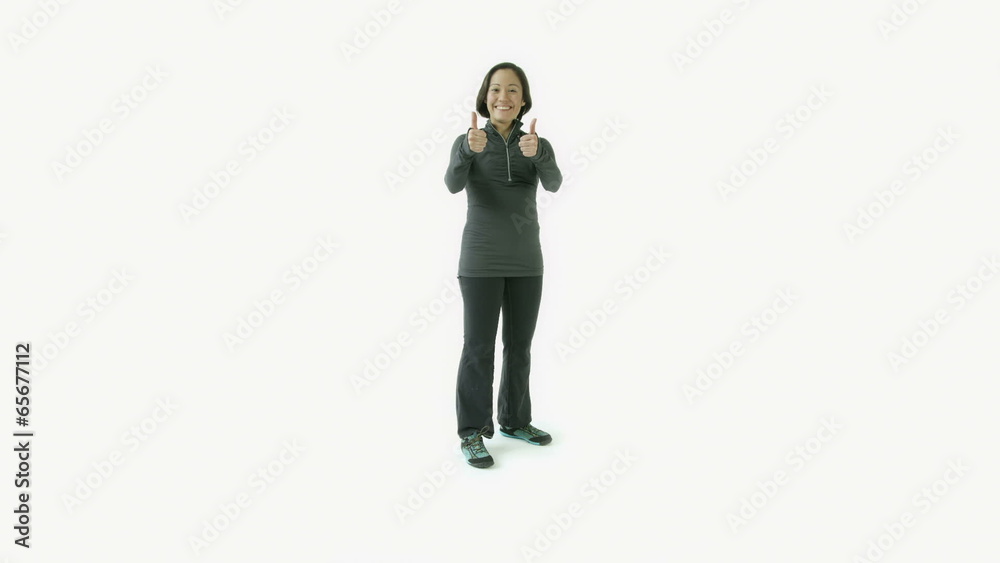 caucasian sporty girl isolated on white smiling with thumbs up caucasian sporty girl isolated on white smiling with thumbs up