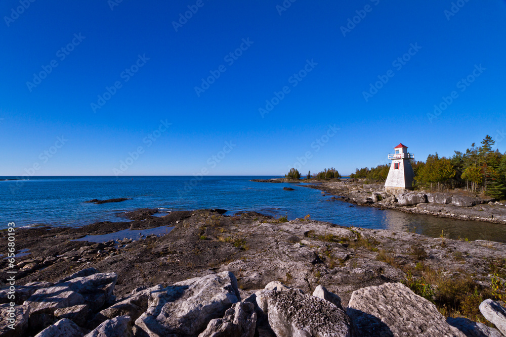 Lighthouse with blue sky as background
