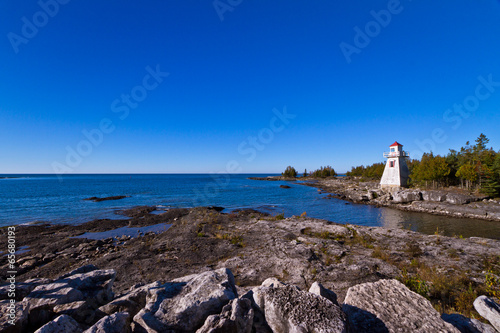 Lighthouse with blue sky as background