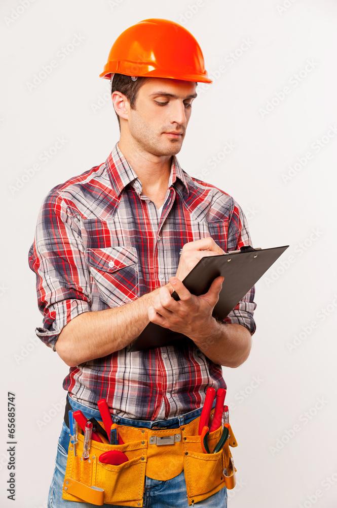Handyman with clipboard. Handyman with clipboard.