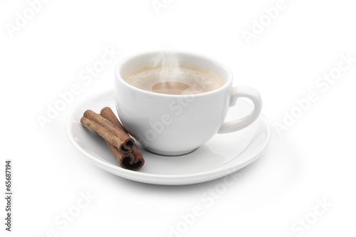cup of coffee with cinnamon sticks