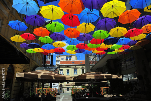Street decorated with colored umbrellas