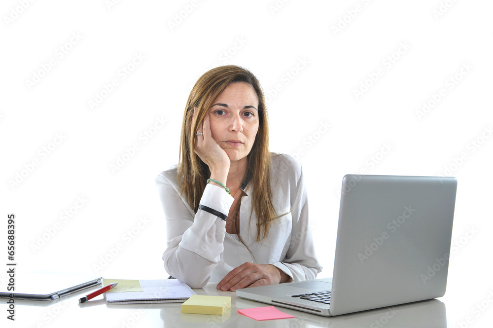 sad business red haired woman in stress at work with computer sad business red haired woman in stress at work with computer
