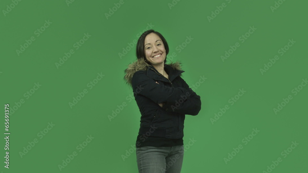 caucasian girl with winter jacket isolated on green screen