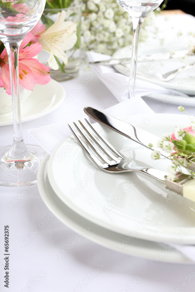 Table setting with spring flowers close up Table setting with spring flowers close up