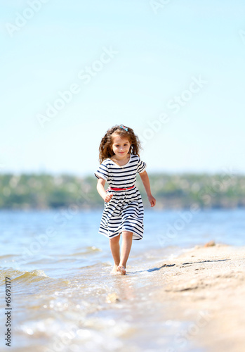 Beautiful little girl on th...