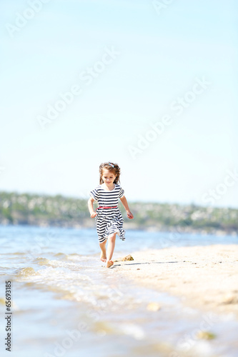 Beautiful little girl on th...