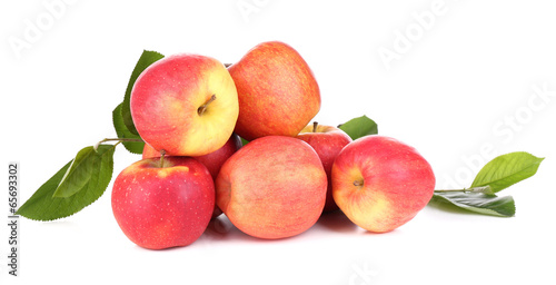 Ripe sweet apples with leaves, isolated on white