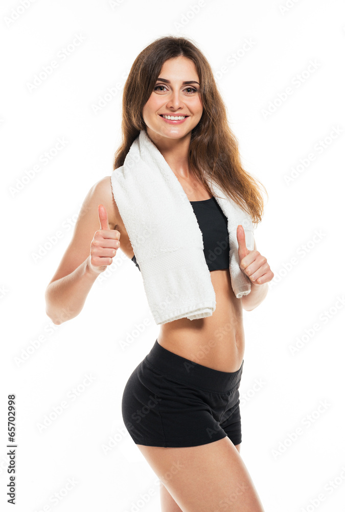Young athletic girl with a towel on white Young athletic girl with a towel on white