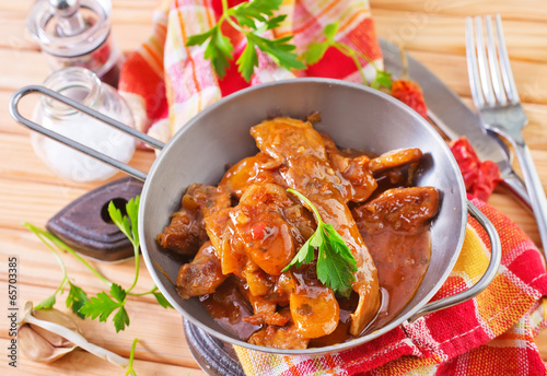 fried meat with tomato sauce