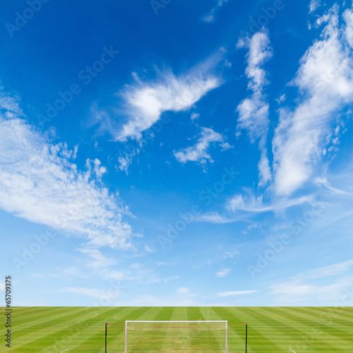 soccer field with blue sky background
