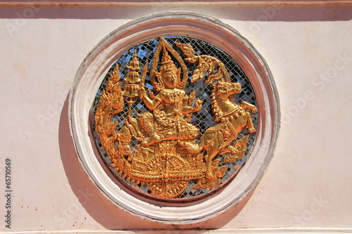 statue of Surya in a thai architectural