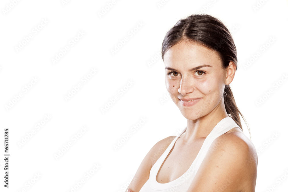 smiling young woman without make-up