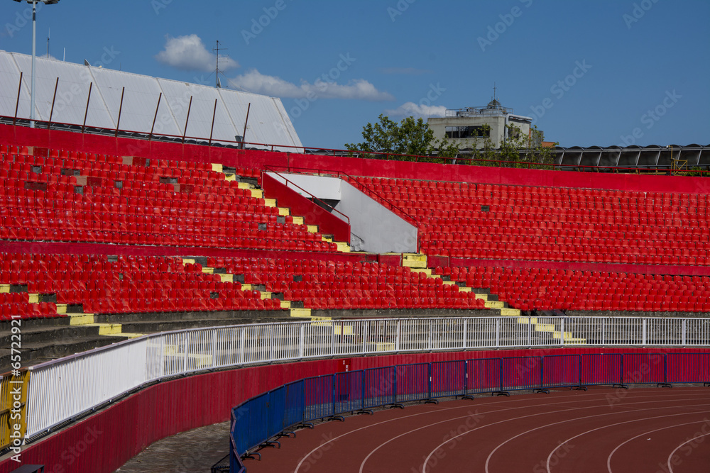 Naklejka premium Seats red at stadium