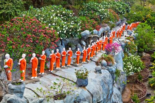 Buddhist monk statues going to Gold Buddha temple, Dambulla, Sri