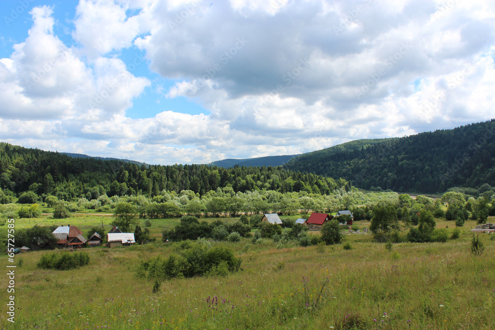 landscape with a village in Carpathian mountains landscape with a village in Carpathian mountains