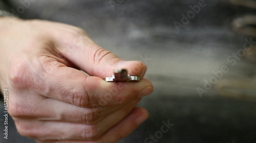 keys and key fob in human hands