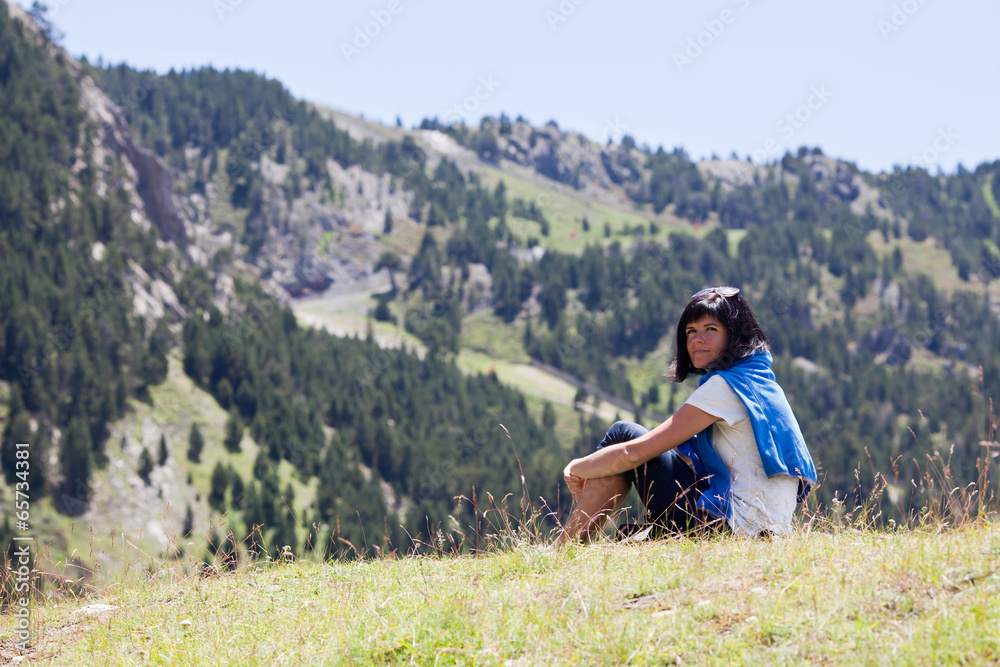 Woman relaxing in the mountain