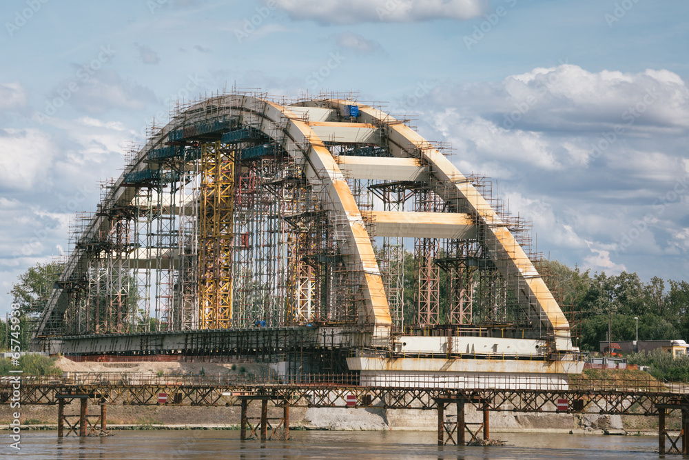 Fototapeta premium Bridge under construction with blue sky