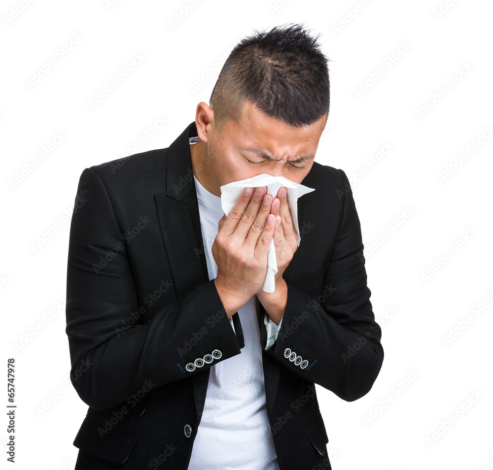 Businessman sneeze