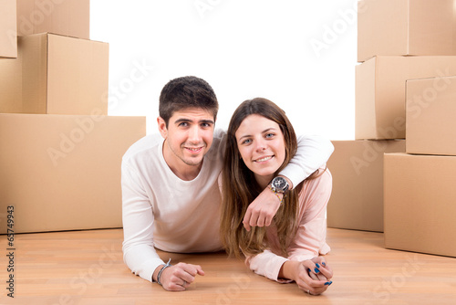 Happy couple with boxes